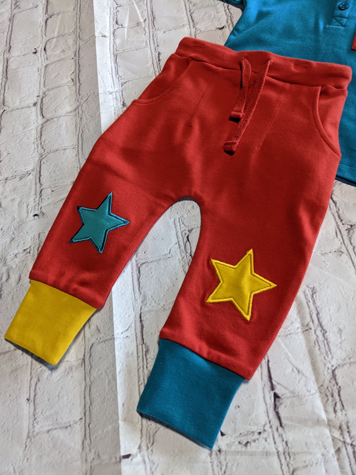 Teal polo and Red Star pants 2 piece